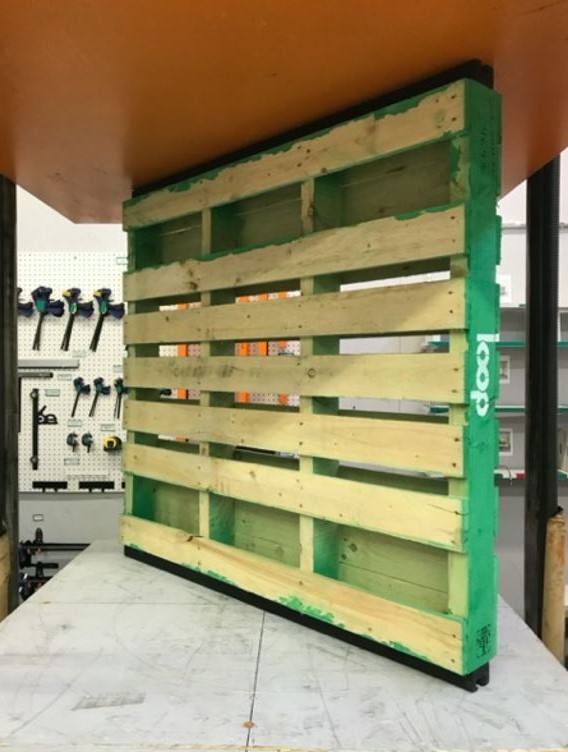 Image 2. Horizontal compression test setup in Tinius Olson machine. 