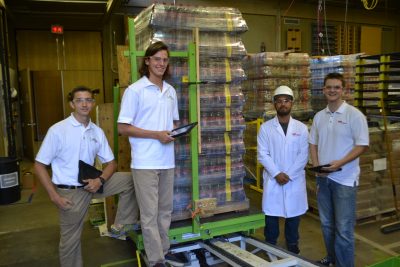 Image 3. Page and the other 2013 interns working on a unit load project in the pallet lab.