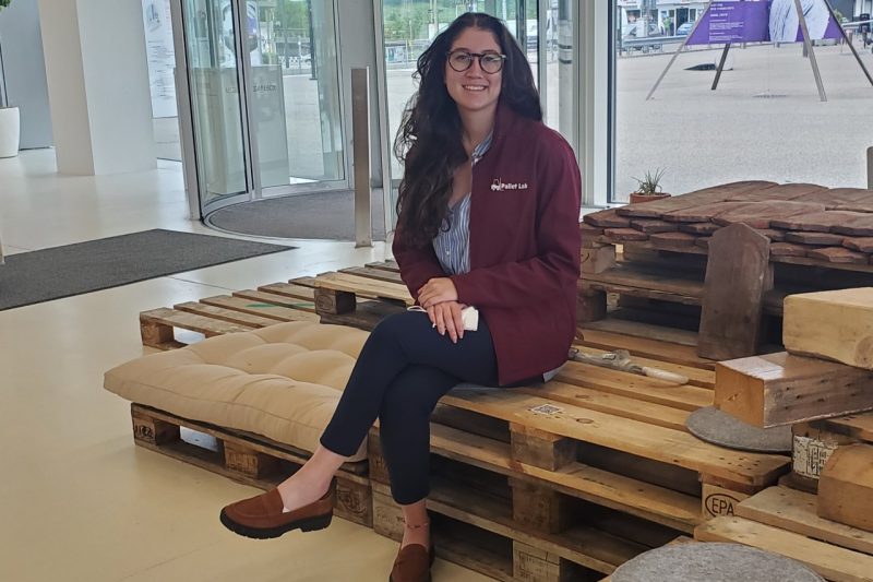 Image 1. Mary Paz Alvarez posing on an art installation and seating area made from used pallets during her travels to Europe with the GPP.. Image 2. Mary Paz Alvarez posing on an art installation and seating area made from used pallets.