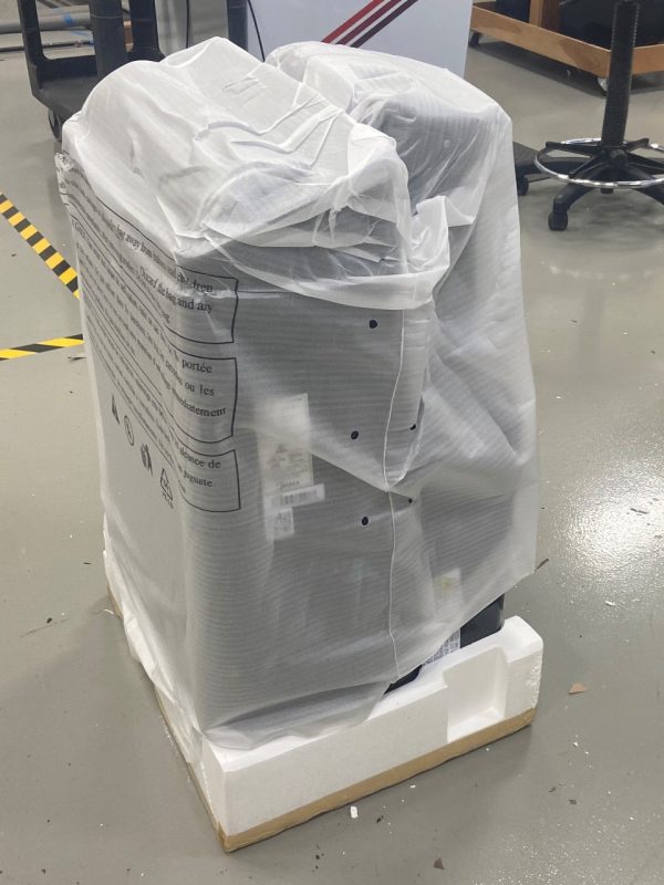 Image 3. Examples of bags and trays used to protect the AC unit within the corrugated packaging. Image 4. Examples of bags and sheets used to protect the AC unit within the corrugated packaging.